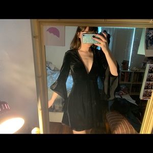 long-sleeved black velvet dress